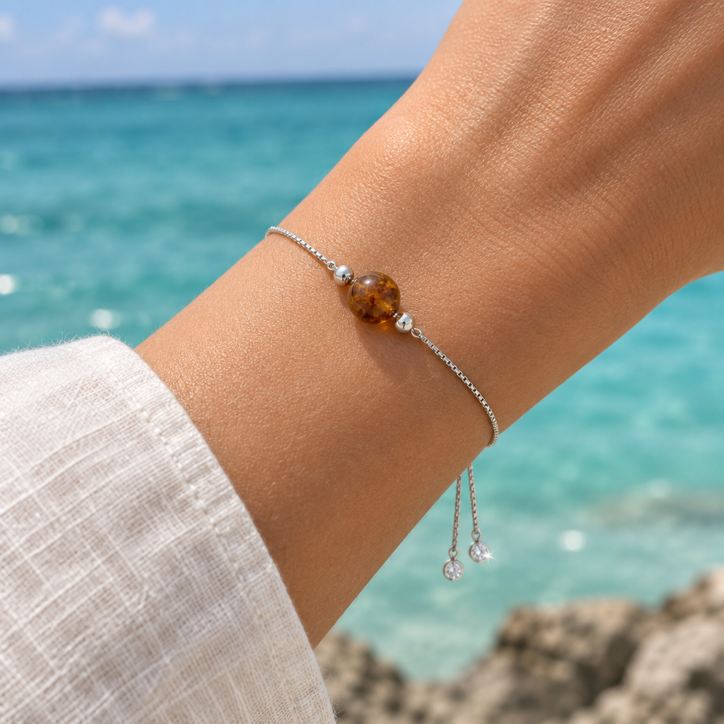 Proposta foto indossata della pulsera con bola de Ámbar