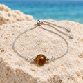Proposta foto prodotto della pulsera con bola de Ámbar e due zirconie