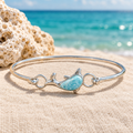 Pulsera Rígida de Delfín con Larimar junto al mar